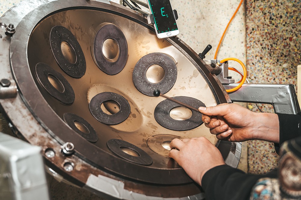 Close-up of precision handpan tuning
